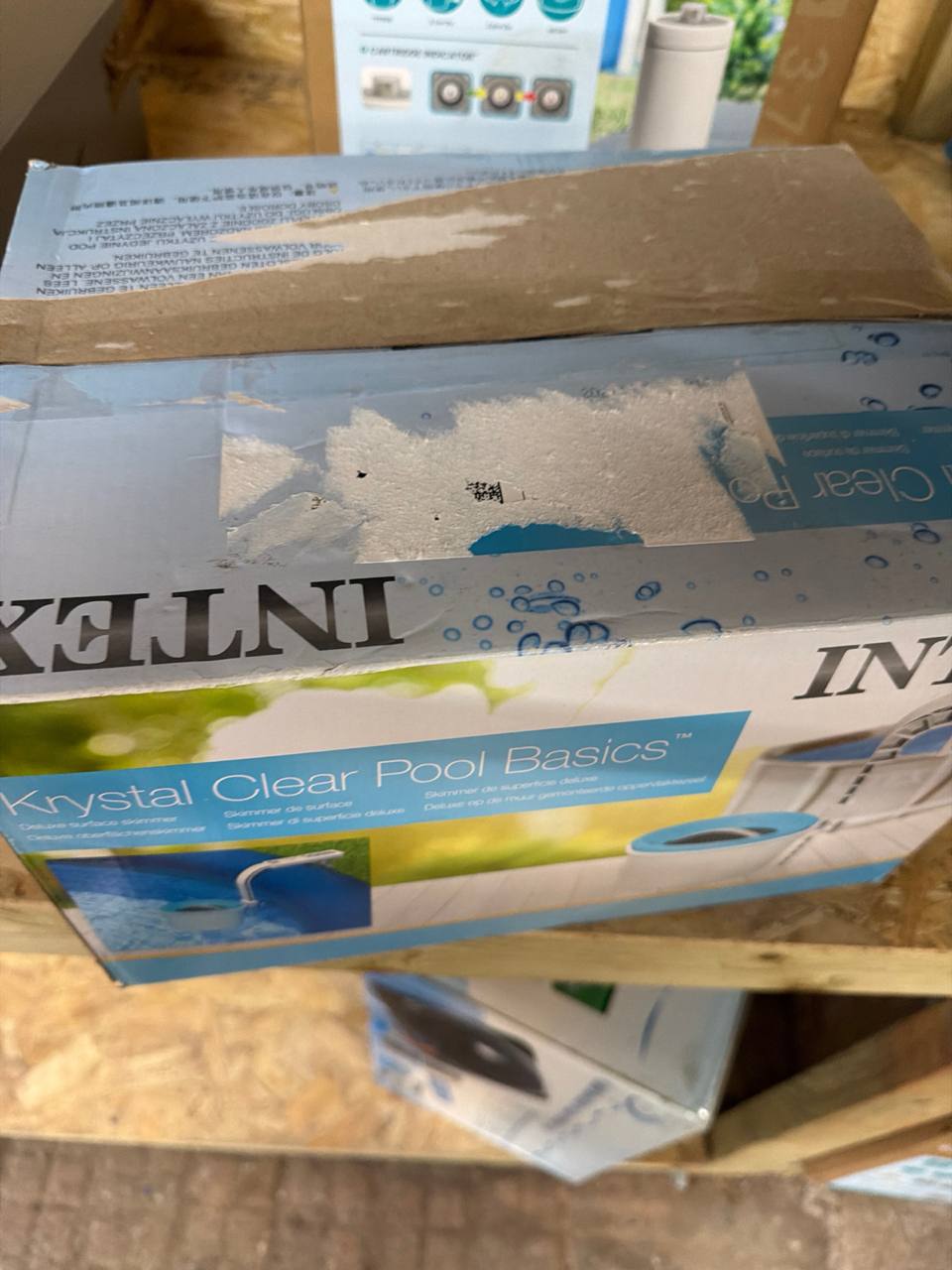 Actual box condition, scuffed and taped
